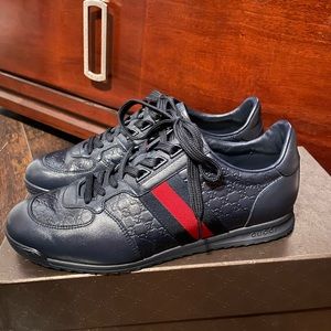 Navy blue men’s Gucci sneakers